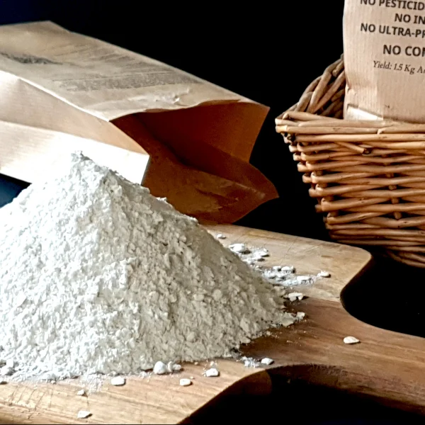 gelli felin organic gluten free artisan bread flour on a board with packet behind.